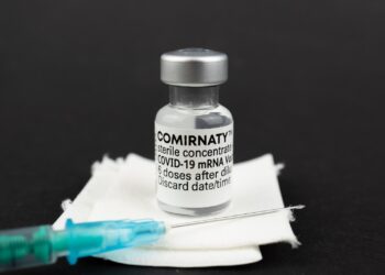 black and white labeled bottle